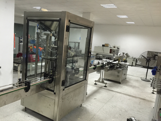 라벨링 머신 캡핑 라인.jpg