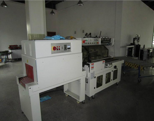 L type sealing shrinkage packing machine L 씰링 수축 포장기.jpg