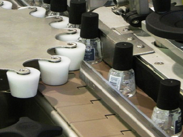 라벨링을 위한 회전식 별 휠이 있는 병.jpg