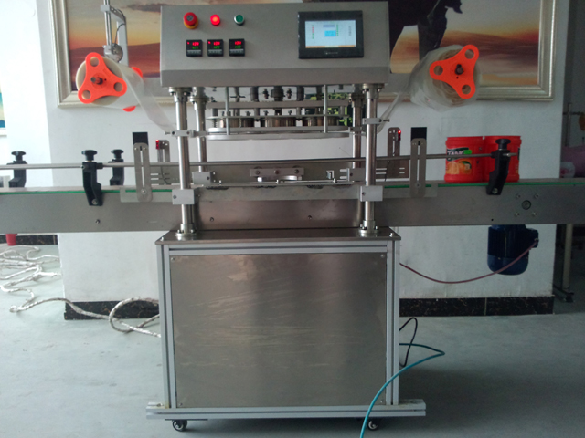 automatic three heads jars sealing equipment 항아리 밀봉기.jpg