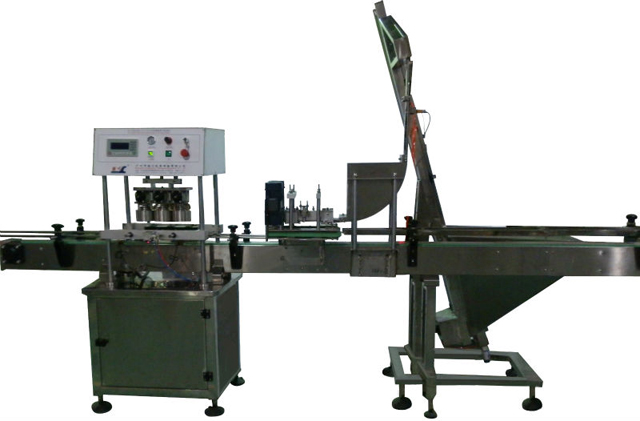 vacuum capping machine 유리병용 진공캡퍼.jpg