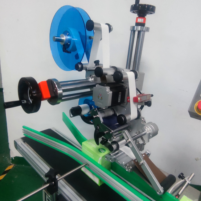 라벨링 헤드 사진.jpg