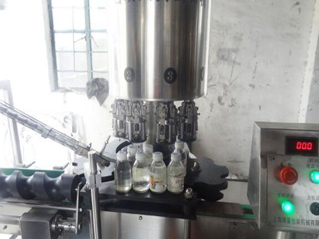 롭 캡핑 기계 내부.jpg