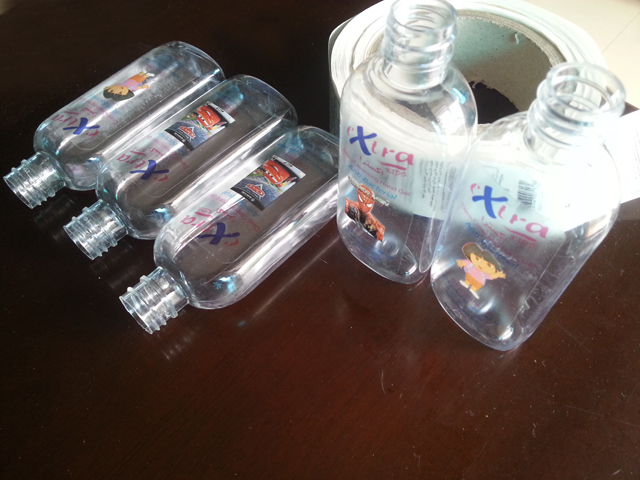 transparent labels labelled samples bottles plane surface Mrwan 샘플 투명 라벨 및 병 (3).jpg