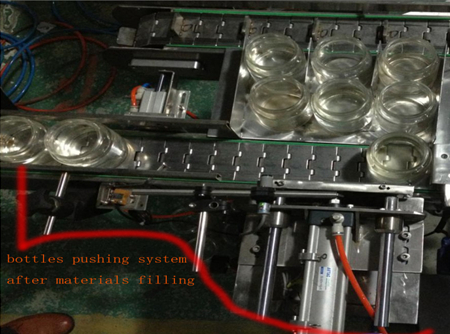 automatic bottles pushing system after filing 병 밀기 시스템.jpg